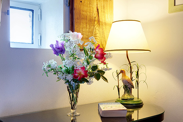 Tulips , roses and spirea in a bedroom at Villa le Barone in Chianti