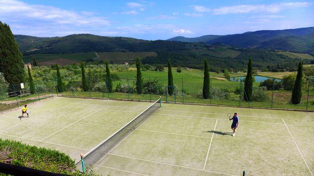 Tennis with a view on Chianti hills  at Villa le Barone Tuscany 